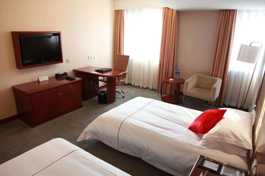 New Gloria Plaza Garden Hotel هاربين الغرفة الصورة