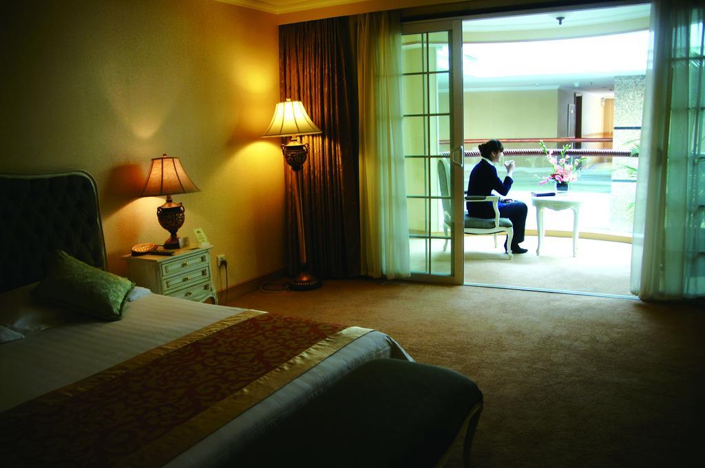 New Gloria Plaza Garden Hotel هاربين الغرفة الصورة