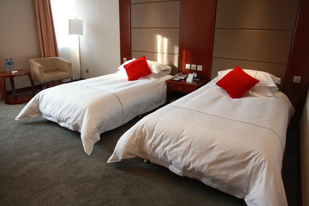 New Gloria Plaza Garden Hotel هاربين الغرفة الصورة