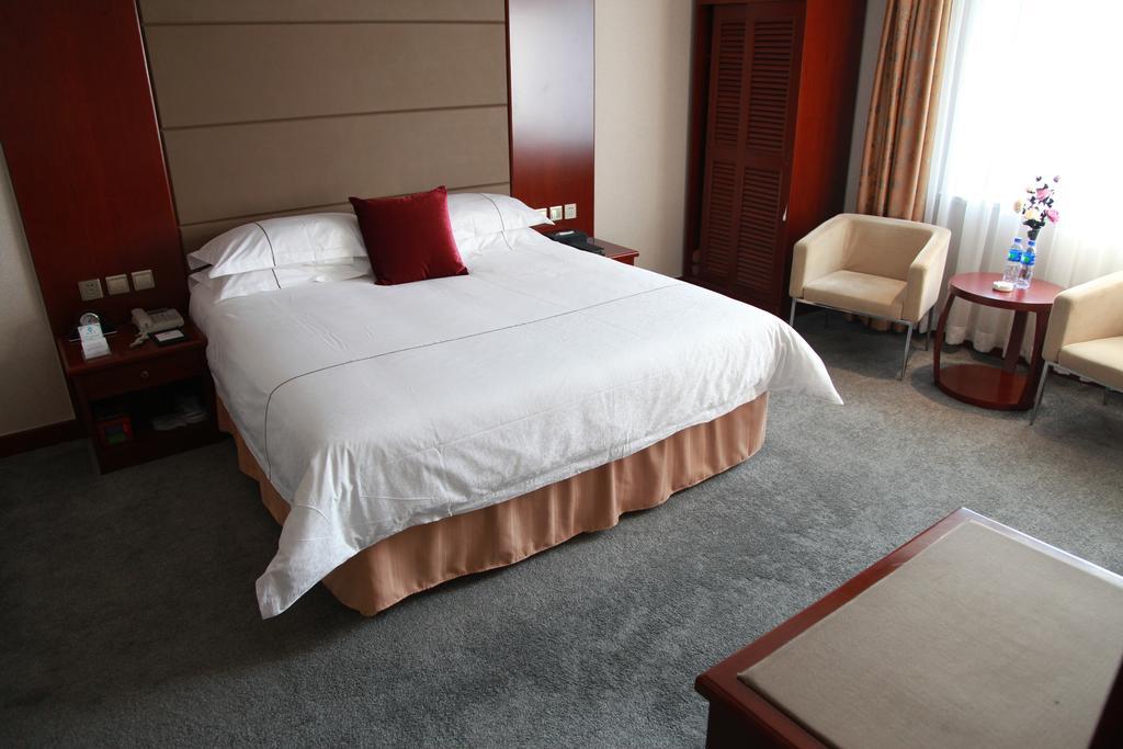 New Gloria Plaza Garden Hotel هاربين الغرفة الصورة